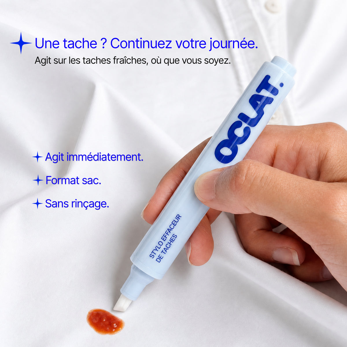 Stylo détachant Oclat en train d'enlever une tache fraîche sur une chemise blanche, pour continuer sa journée sans se changer.